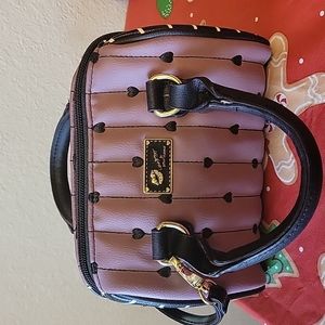 Black, mauve, and white mini Betsey Johnson  purse